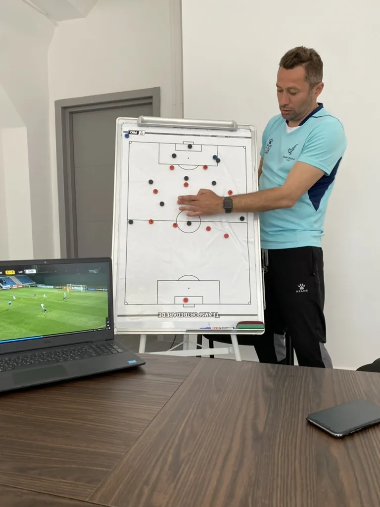 Tactical session review with a coaching staff